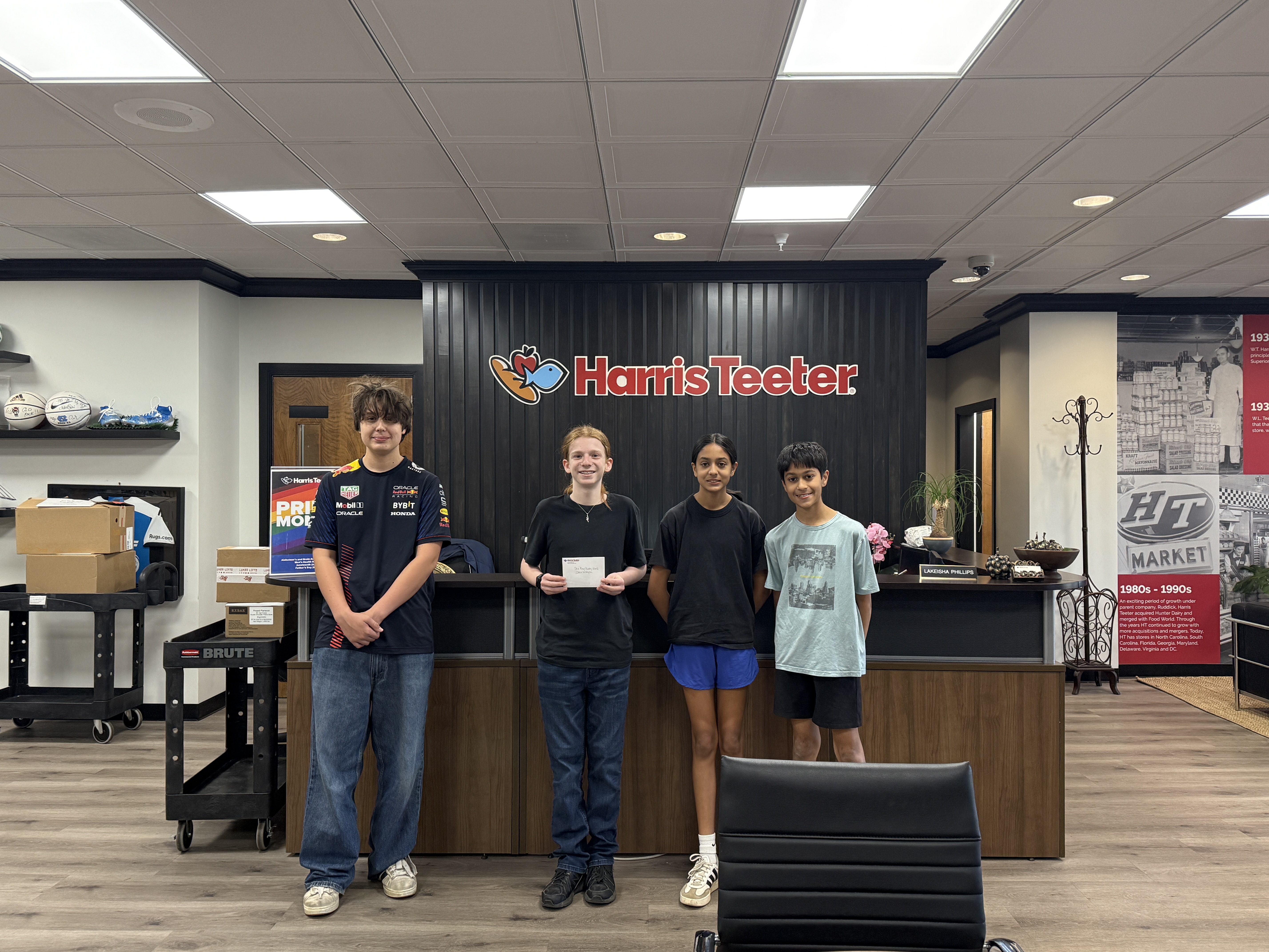 One Bag Pantry Meals team at Harris Teeter customer service desk